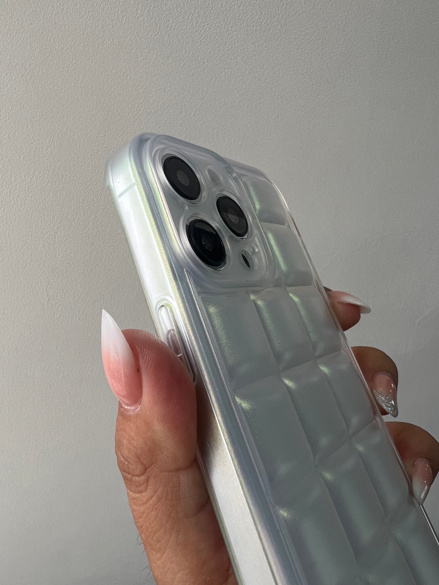 Puffer cuadros tornasol